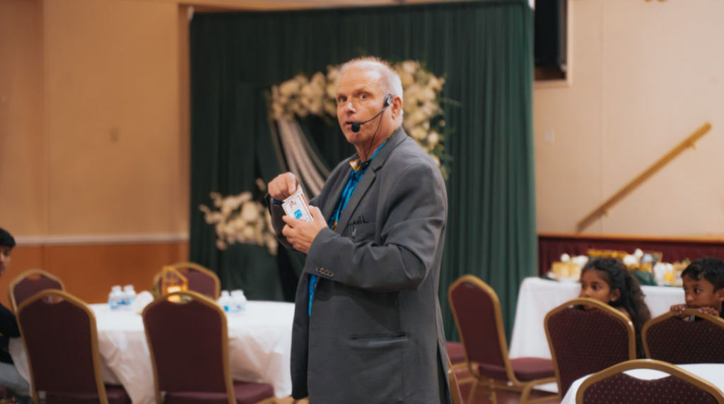 Rick Deezie Corporate Mentalism Performance wideshot | Rick Deezie Rick Deezie presenting interactive magic and mentalism during a Philadelphia-area corporate event.